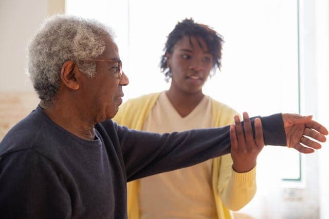 Caregiver and client smiling